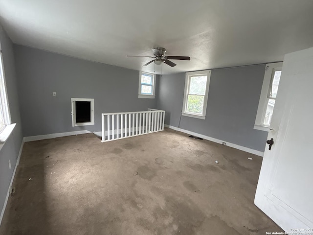 329 Hot Wls, San Antonio, TX 78223 - carpeted spare room with baseboards, a ceiling fan, and visible vents