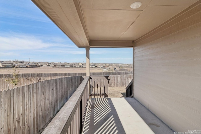 balcony featuring a residential view
