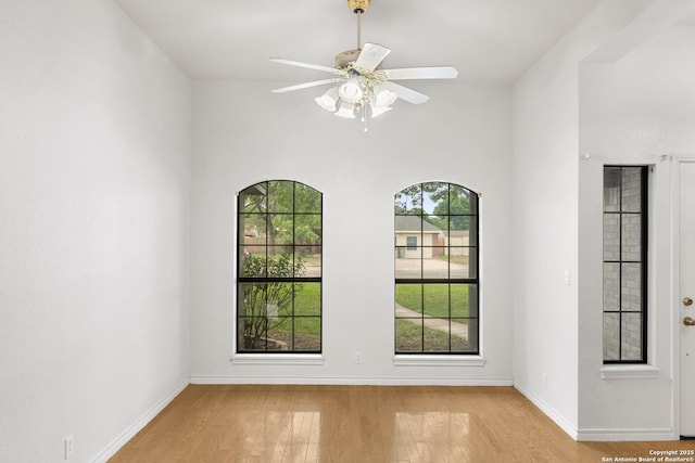 109 Weeping Willow, Uvalde, TX 78801 - unfurnished room with light wood-style flooring, baseboards, and ceiling fan