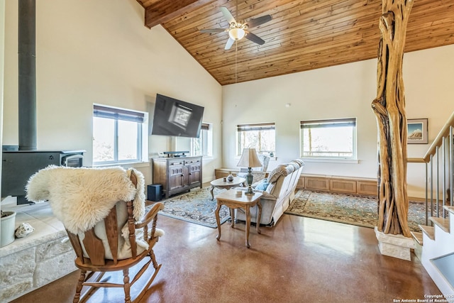 living room with high vaulted ceiling, a ceiling fan, wooden ceiling, beam ceiling, and stairs