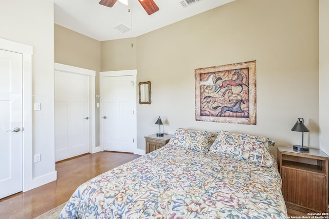 bedroom with visible vents, baseboards, and ceiling fan