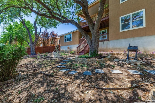 6222 Amber Rose, San Antonio, TX 78253 - view of yard with fence, a balcony, and stairway