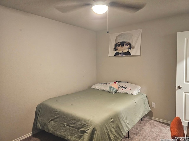 bedroom with baseboards, carpet flooring, and ceiling fan