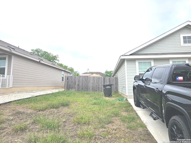 view of yard featuring fence