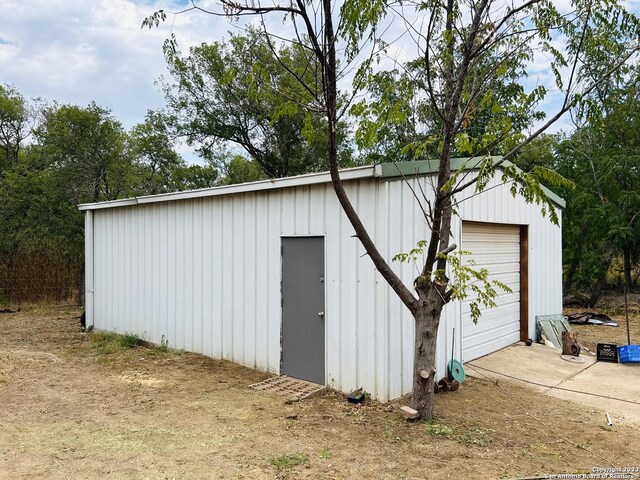 5764 Fm 1628, Adkins, TX 78101 - view of outbuilding featuring an outdoor structure
