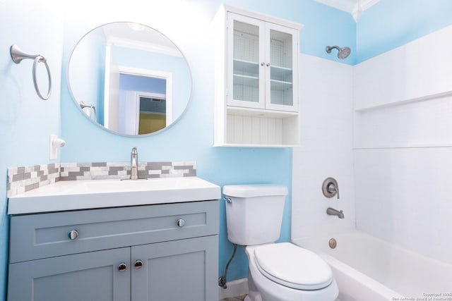 full bathroom with washtub / shower combination, toilet, and vanity