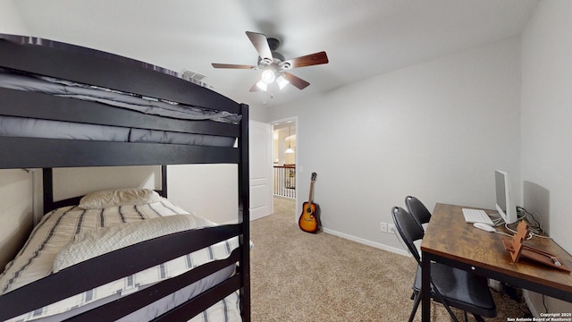 bedroom with carpet floors, a ceiling fan, visible vents, and baseboards