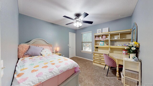 bedroom with baseboards, carpet floors, and ceiling fan