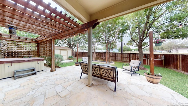 view of patio / terrace with a pergola, a storage shed, a fenced backyard, a hot tub, and an outbuilding