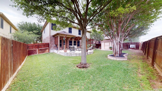view of yard featuring a fenced backyard, an outbuilding, a patio area, and a shed