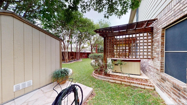 view of yard featuring a pergola, visible vents, and a fenced backyard