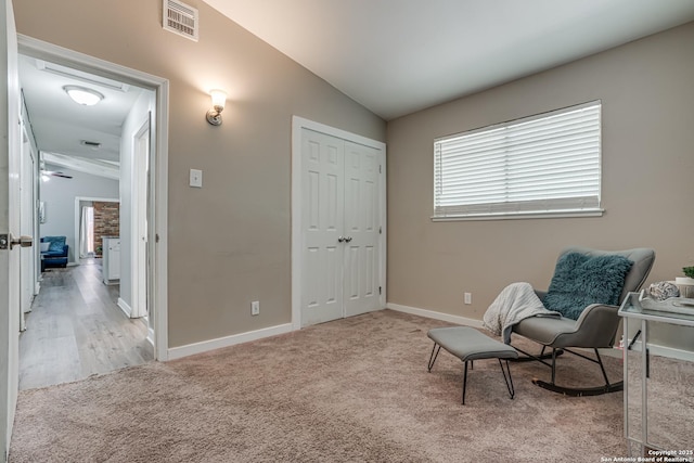 5011 Village Lawn, San Antonio, TX 78218 - sitting room with lofted ceiling, visible vents, baseboards, and carpet