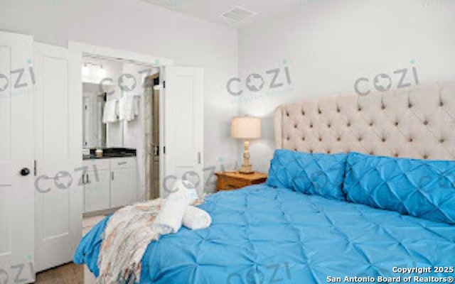930 S Eagle St Unit 104, Fredericksburg, TX 78624 - bedroom featuring ensuite bath