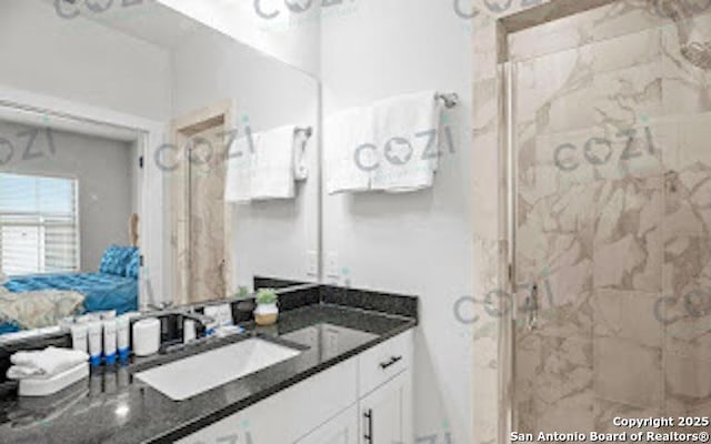 930 S Eagle St Unit 104, Fredericksburg, TX 78624 - full bathroom with vanity and a stall shower