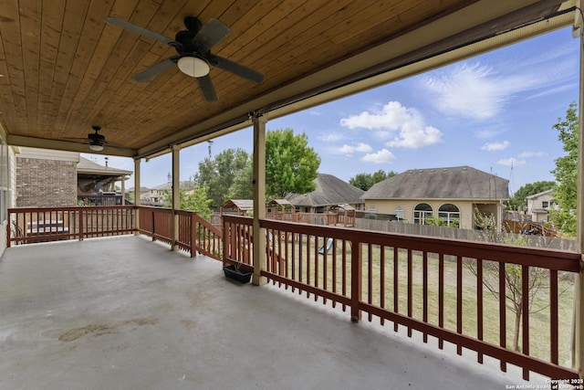 view of patio with ceiling fan, a fenced backyard, and a residential view