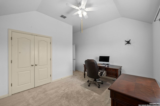 home office with light colored carpet, ceiling fan, lofted ceiling, and visible vents