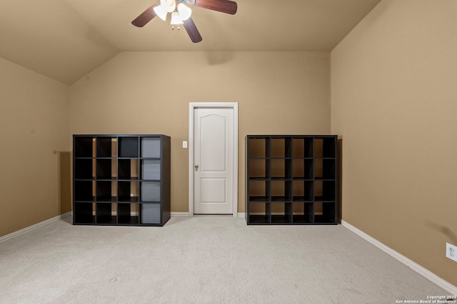 bonus room with lofted ceiling, baseboards, carpet, and ceiling fan