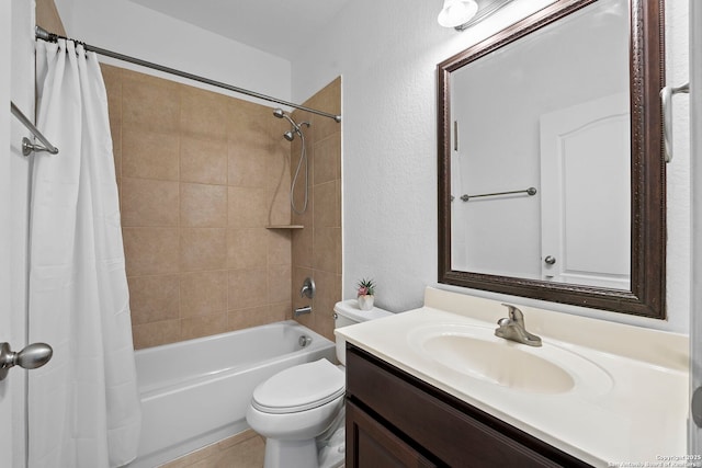 bathroom featuring shower / tub combo with curtain, toilet, and vanity
