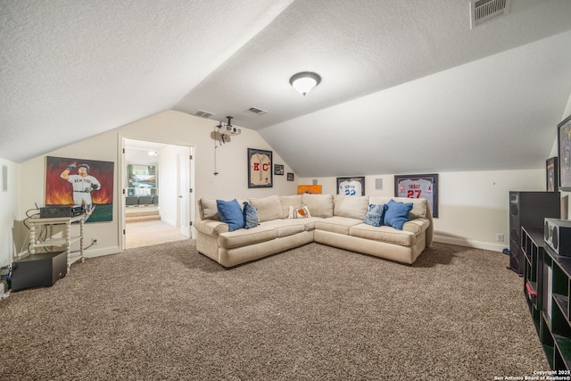 carpeted living room featuring lofted ceiling, a textured ceiling, and visible vents