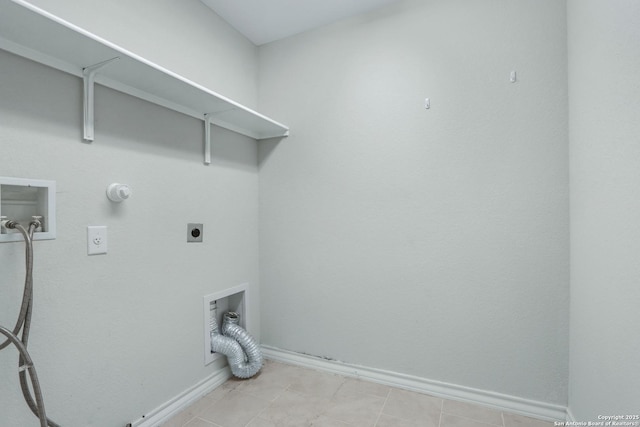 clothes washing area with hookup for an electric dryer, baseboards, washer hookup, hookup for a gas dryer, and laundry area