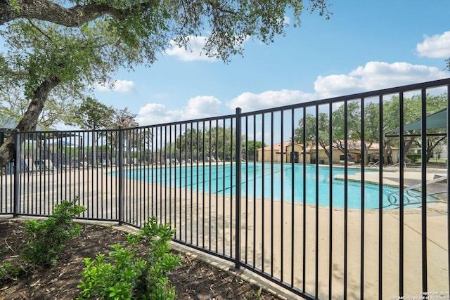 community pool with fence