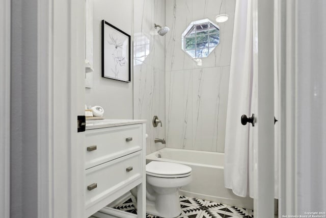 full bathroom with shower / bathtub combination, toilet, vanity, and tile patterned floors