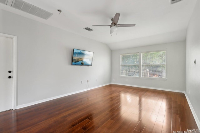 empty room with wood finished floors, visible vents, baseboards, and ceiling fan