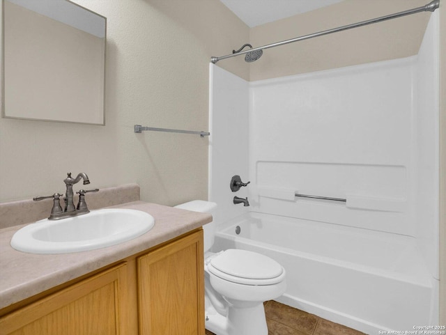bathroom featuring bathing tub / shower combination, vanity, tile patterned flooring, and toilet