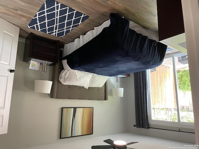 unfurnished bedroom featuring multiple windows