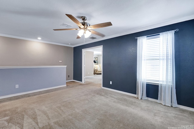 7143 Dulce Mdw, San Antonio, TX 78252 - spare room featuring carpet, visible vents, a ceiling fan, crown molding, and baseboards