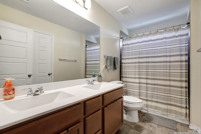 7143 Dulce Mdw, San Antonio, TX 78252 - full bath featuring toilet, a sink, visible vents, and double vanity