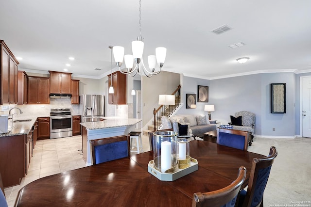 7143 Dulce Mdw, San Antonio, TX 78252 - dining area featuring recessed lighting, an inviting chandelier, visible vents, crown molding, and stairs