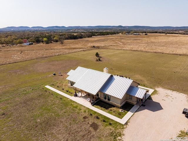 birds eye view of property featuring a rural view and a mountain view