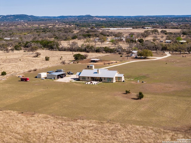 birds eye view of property featuring a rural view and a mountain view
