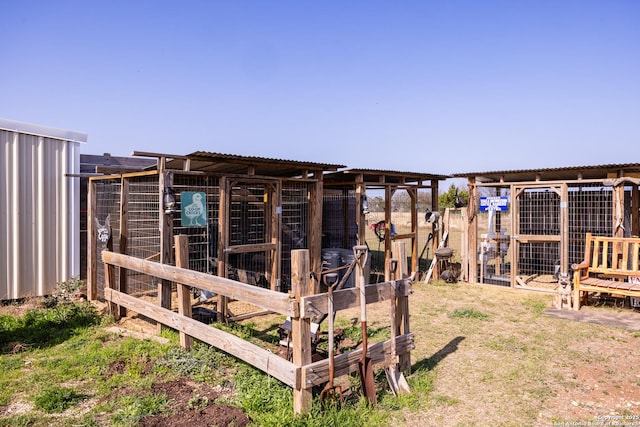 view of yard with an outdoor structure and exterior structure