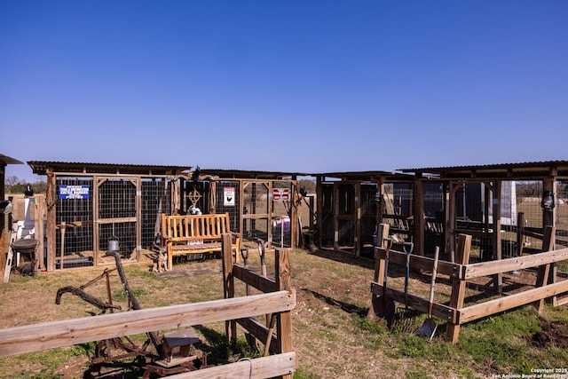 view of yard with exterior structure and an outdoor structure