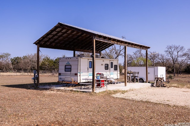 exterior space featuring a detached carport