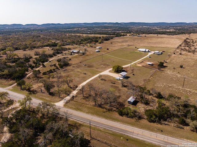 birds eye view of property featuring a rural view and a mountain view