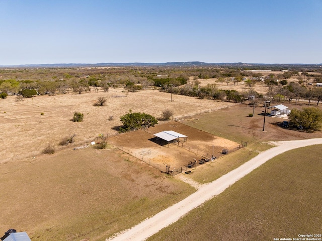 bird's eye view with a rural view and view of desert
