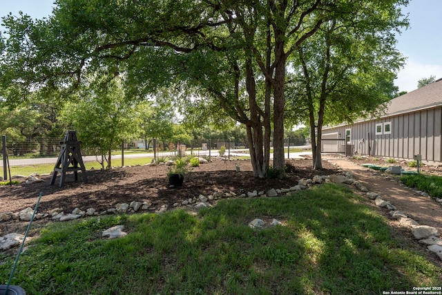 view of yard with fence