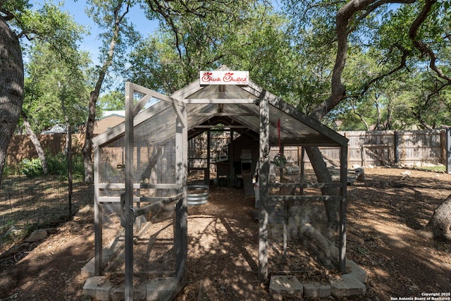 view of poultry coop with fence