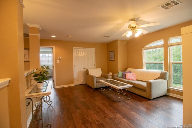 511 Mesa Rdg, San Antonio, TX 78258 - living room with baseboards, visible vents, and dark wood-style floors