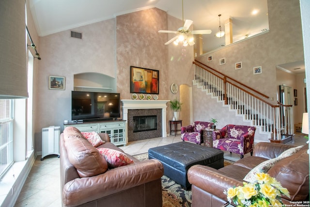 511 Mesa Rdg, San Antonio, TX 78258 - living room featuring high vaulted ceiling, a ceiling fan, stairs, and visible vents