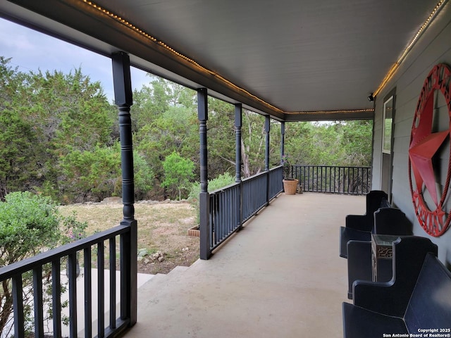 view of patio with a balcony