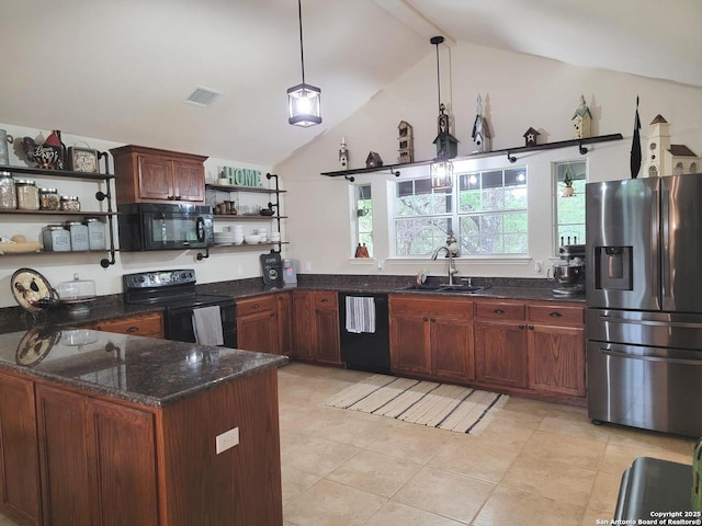 kitchen featuring dark stone counters, open shelves, a sink, black appliances, and lofted ceiling