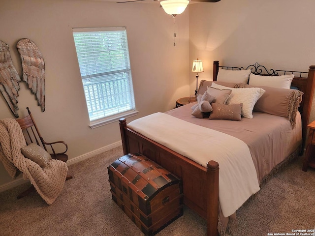 carpeted bedroom featuring a ceiling fan and baseboards