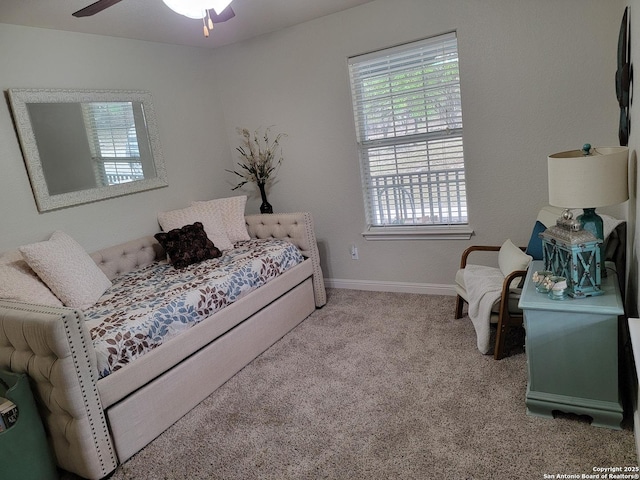 bedroom with carpet flooring, baseboards, and ceiling fan