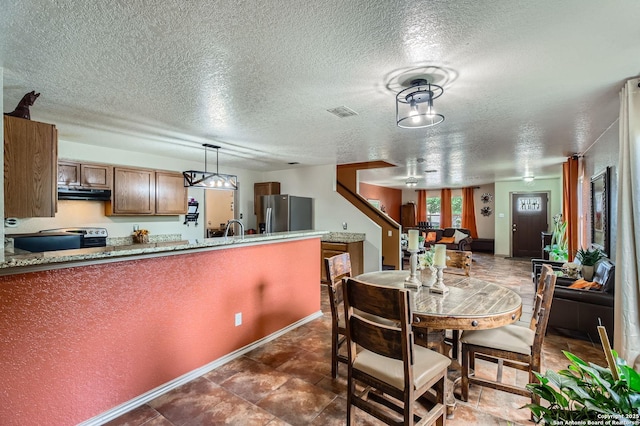 5402 Palamon Farm, San Antonio, TX 78228 - dining room featuring a textured ceiling and visible vents