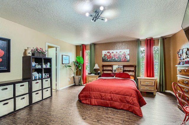 5402 Palamon Farm, San Antonio, TX 78228 - bedroom featuring wood finished floors, a textured ceiling, and baseboards