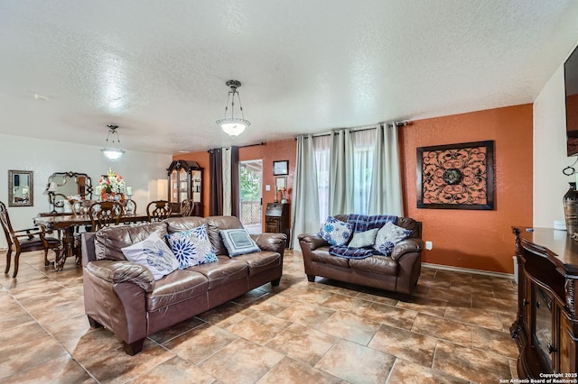 5402 Palamon Farm, San Antonio, TX 78228 - living area with baseboards and a textured ceiling